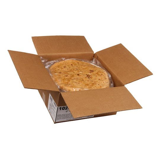 A cardboard box with flaps open revealing a large, round tortilla wrapped in clear plastic inside.