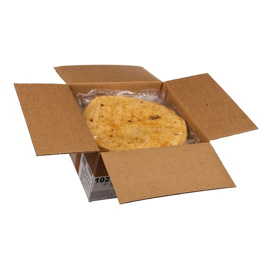 An open cardboard box containing a stack of yellow, round tortillas wrapped in clear plastic, viewed from above on a white background.