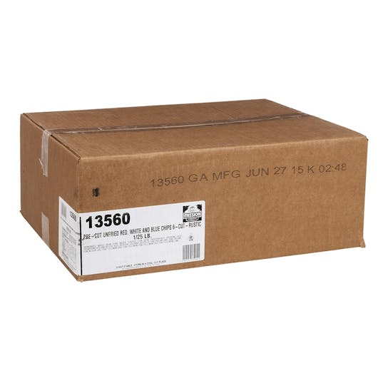A large brown cardboard shipping box labeled 13560 PRE-CUT UNFRIED RED, WHITE AND BLUE CHIPS, with product and manufacturing details printed on a white sticker.